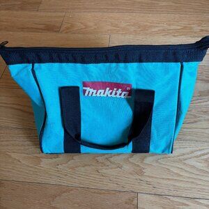 Blue Makita tool bag with black handles.